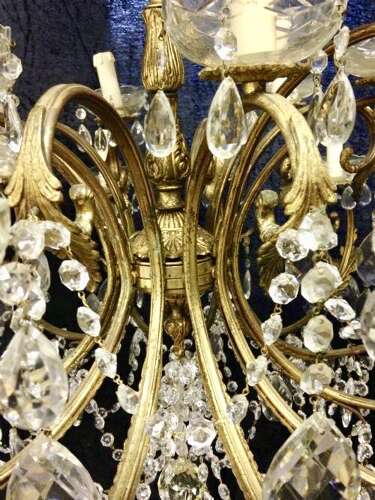 A Large Italian Antique Brass and Crystal 18 light Chandelier