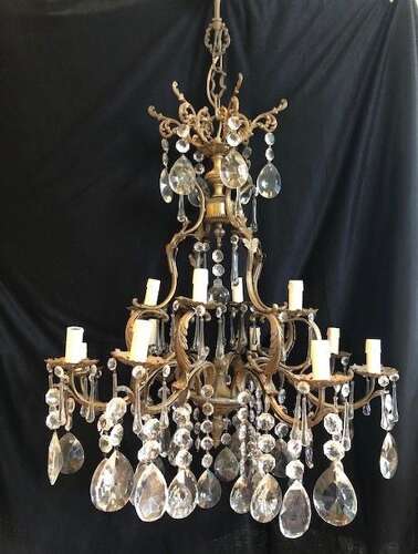 A Large Twelve Light Dark Framed Italian Two Tier Antique Chandelier