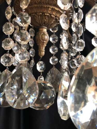 A Large Twelve Light Dark Framed Italian Two Tier Antique Chandelier