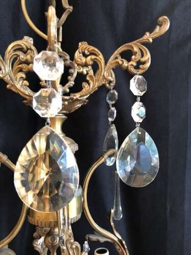 A Large Twelve Light Dark Framed Italian Two Tier Antique Chandelier