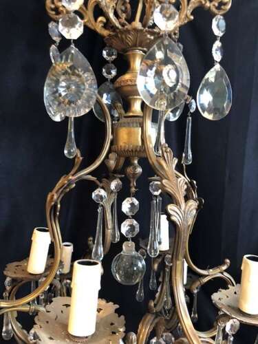 A Large Twelve Light Dark Framed Italian Two Tier Antique Chandelier