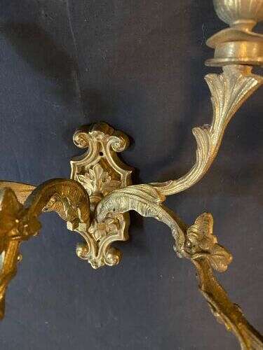 A PAIR OF FIVE ARM BRASS FRENCH WALL-LIGHTS