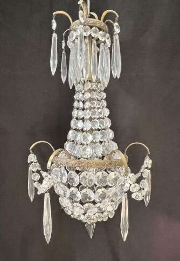 Four Light French Antique Brass and Crystal Chandelier