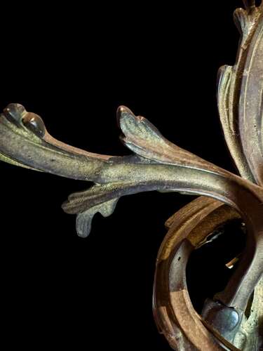 A set of 4 French Triple Arm Antique Brass Wall Lights