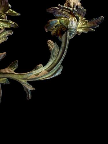 A set of 4 French Triple Arm Antique Brass Wall Lights