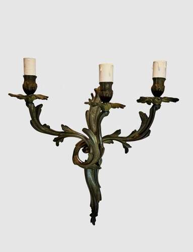 A set of 4 French Triple Arm Antique Brass Wall Lights