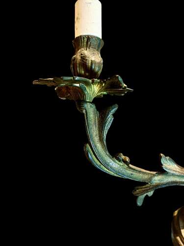 A set of 4 French Triple Arm Antique Brass Wall Lights