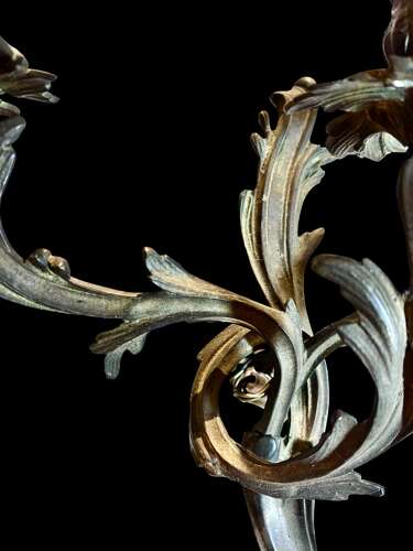 A set of 4 French Triple Arm Antique Brass Wall Lights