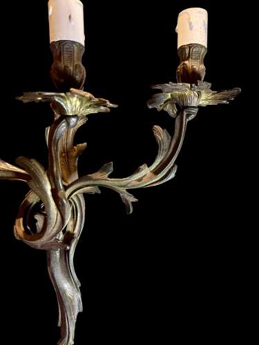 A set of 4 French Triple Arm Antique Brass Wall Lights