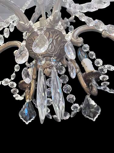 A  Pair of Six Light French Brass and Crystal Antique Chandeliers