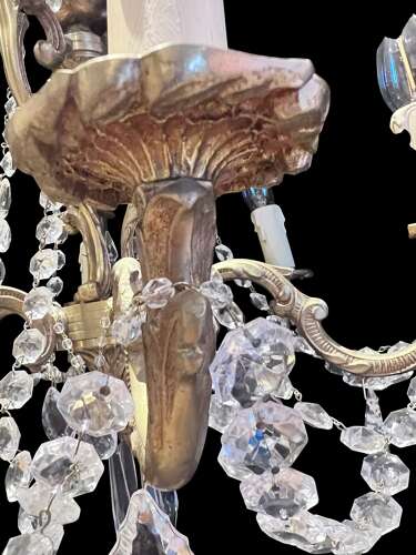 A  Pair of Six Light French Brass and Crystal Antique Chandeliers