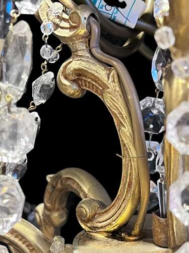 A  Pair of Six Light French Brass and Crystal Antique Chandeliers