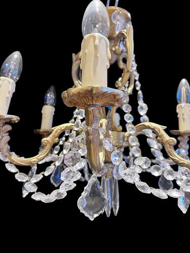 A  Pair of Six Light French Brass and Crystal Antique Chandeliers