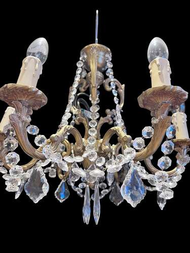 A  Pair of Six Light French Brass and Crystal Antique Chandeliers